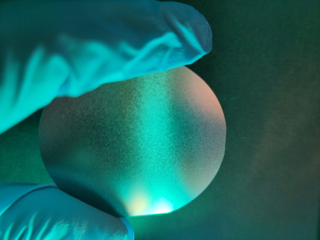 A wafer in turquoise light.